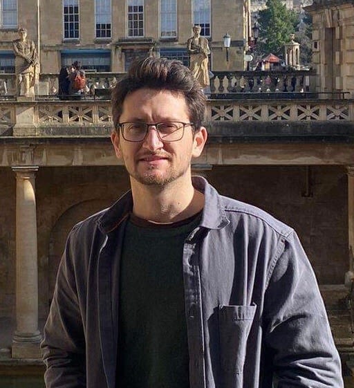 Man smiling at the camera.